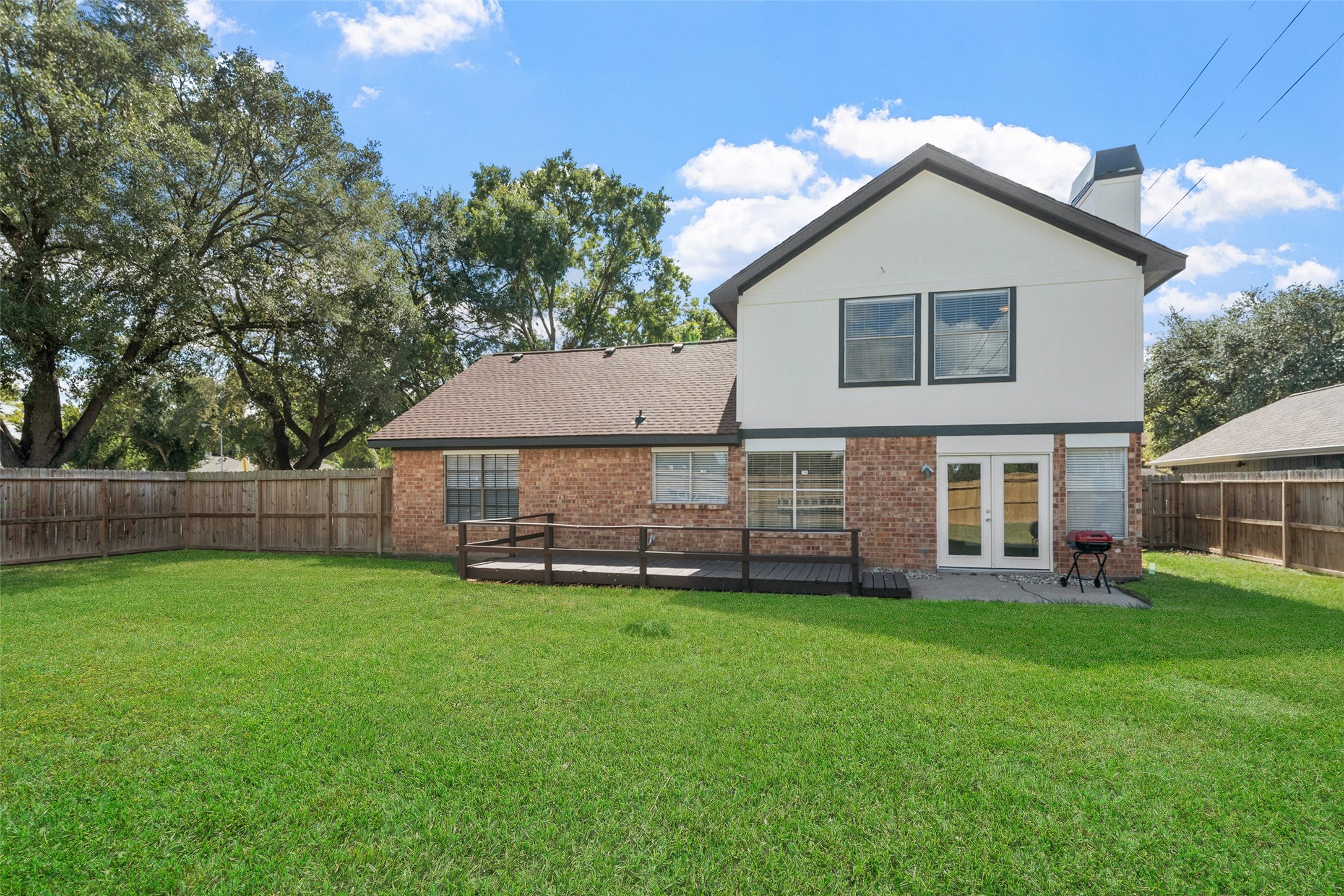 10402 Trading Post Drive Houston, TX 77064 - Photo 30 of 43 a view of a house with a yard and sitting area