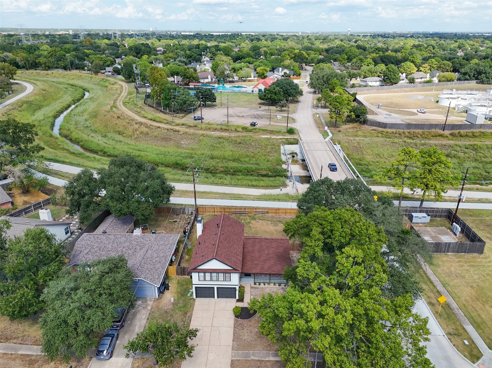 10402 Trading Post Drive Houston, TX 77064 - Photo 32 of 43 an aerial view of residential houses with outdoor space and street view