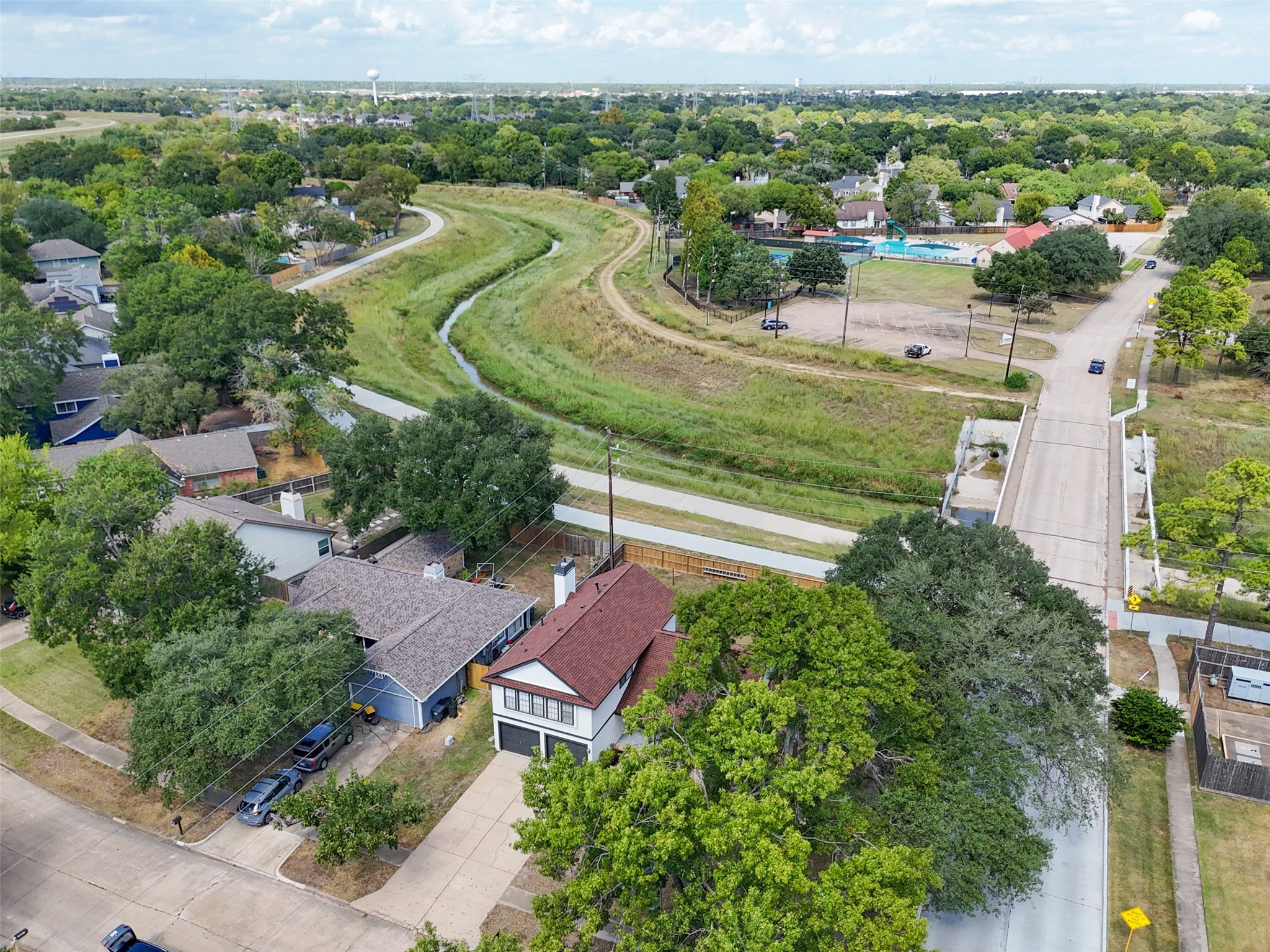 10402 Trading Post Drive Houston, TX 77064 - Photo 34 of 43 an aerial view of residential houses with outdoor space and river
