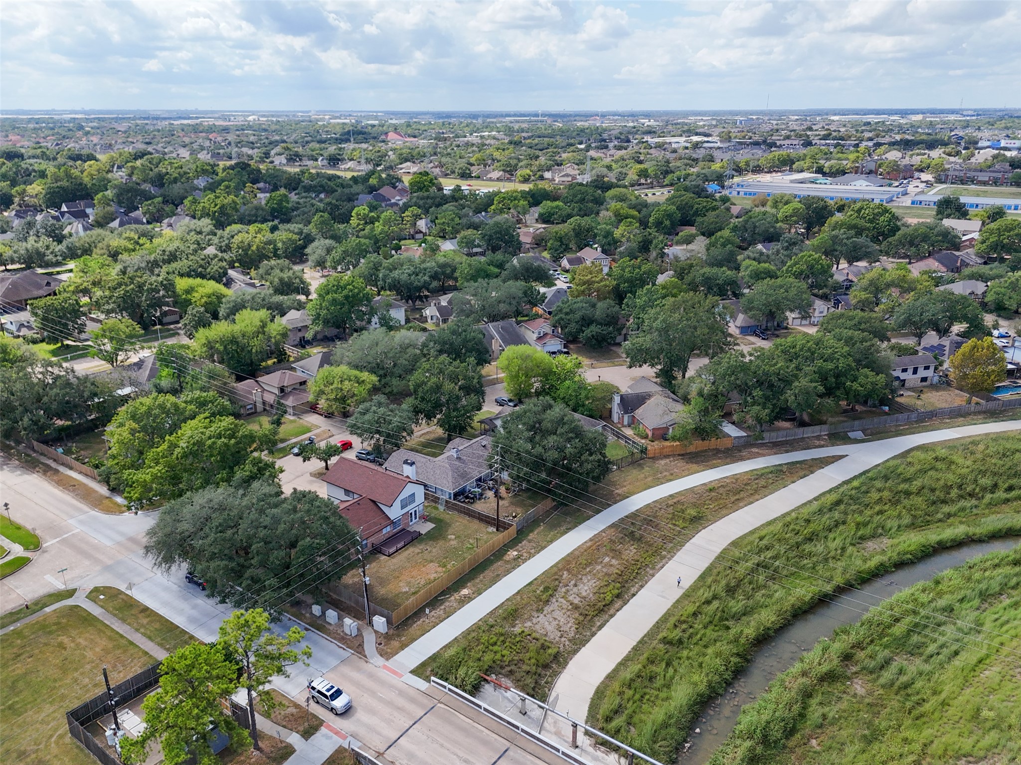 10402 Trading Post Drive Houston, TX 77064 - Photo 38 of 43 an aerial view of residential houses with outdoor space and trees