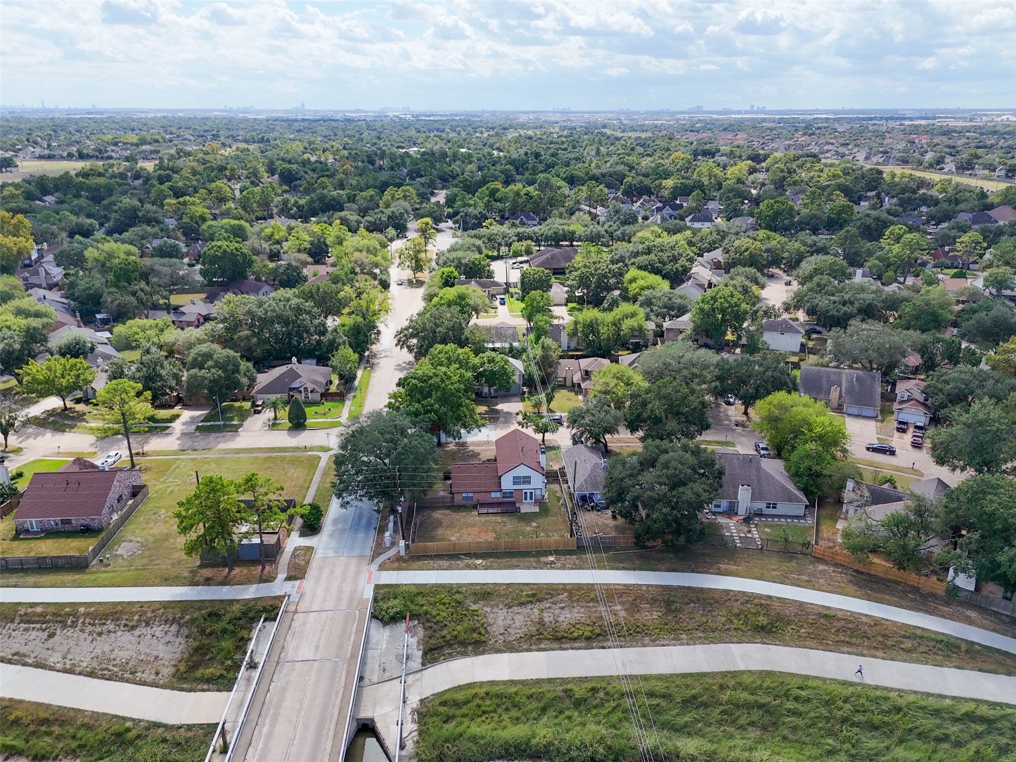 10402 Trading Post Drive Houston, TX 77064 - Photo 40 of 43 an aerial view of residential houses with outdoor space and trees
