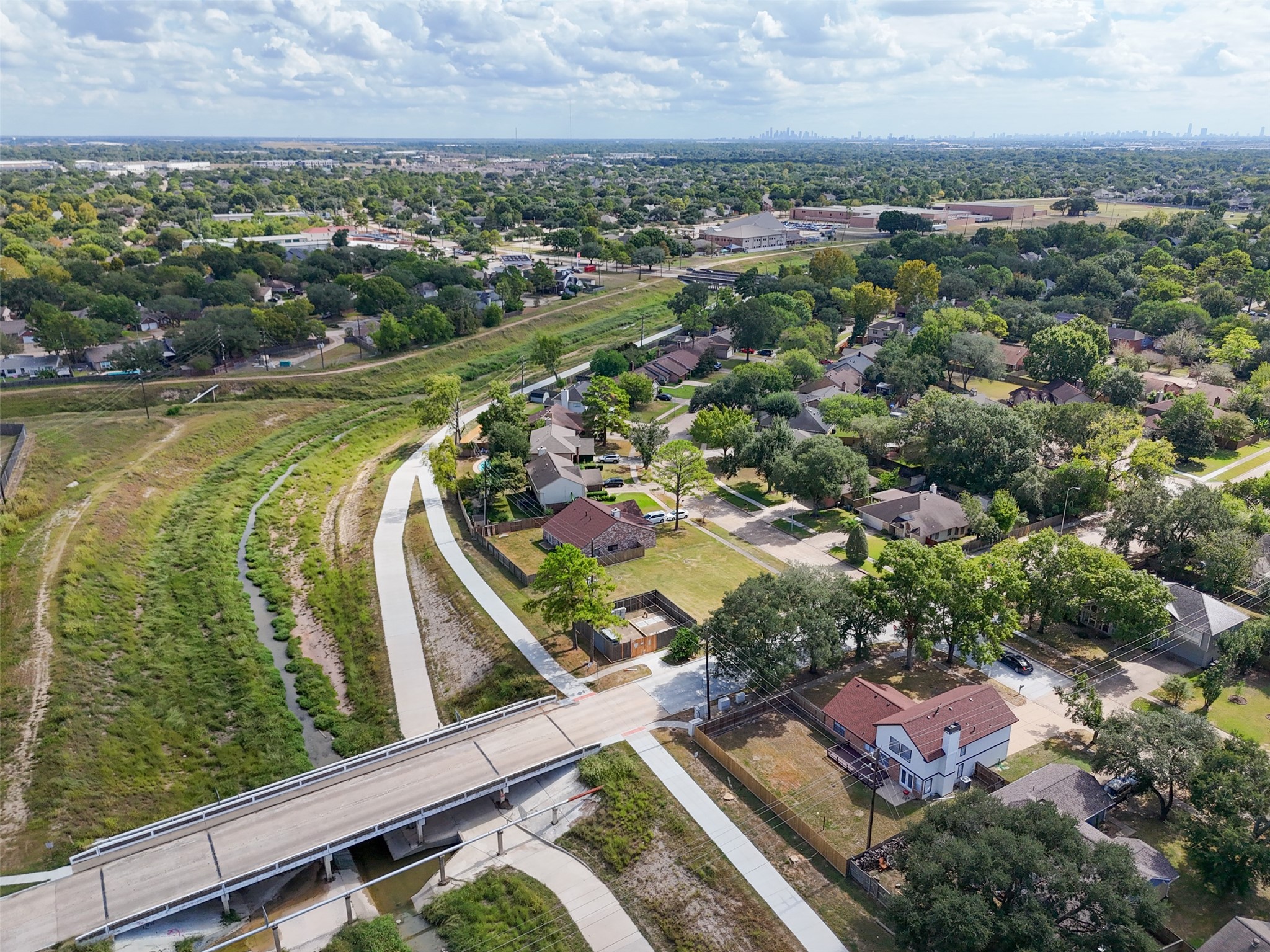 10402 Trading Post Drive Houston, TX 77064 - Photo 43 of 43 an aerial view of residential houses with outdoor space and river