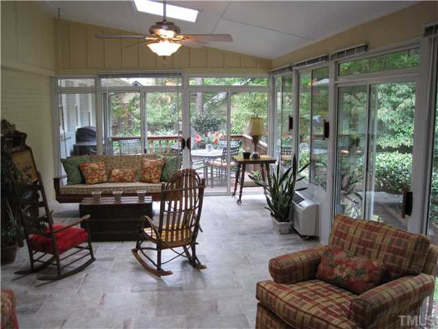 8813 Brandon Station Road Raleigh, NC 27613 - Photo 6 of 18 Large Sunroom...like sitting outside with all the inside comforts. Sun Room