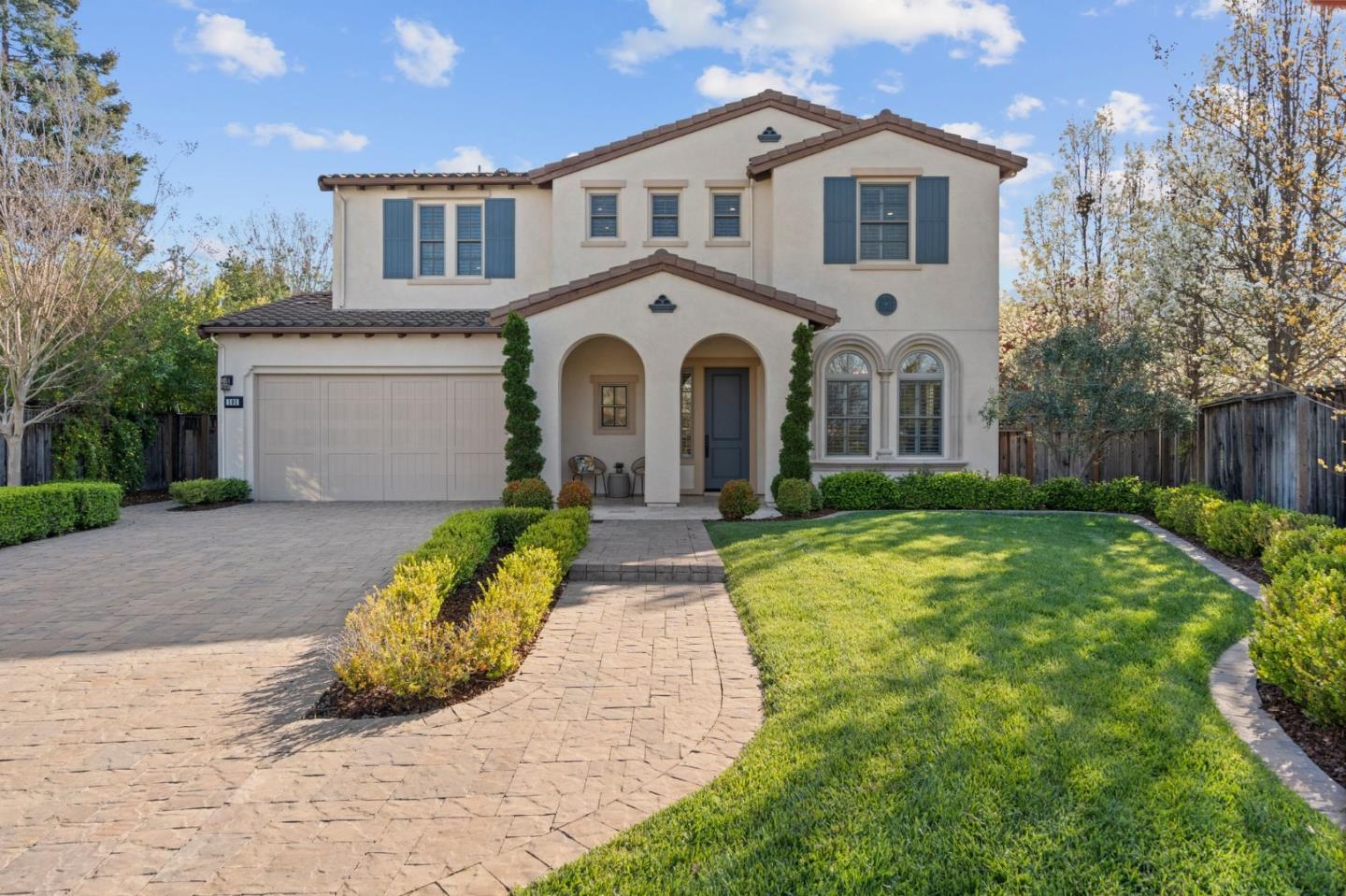 101 Mansfield Drive Mountain View, CA 94040 - Photo 1 of 1 a front view of a house with a yard and garage
