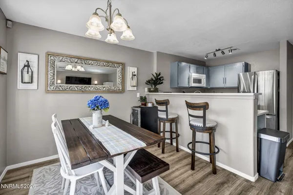 a vase of flowers sitting on a table