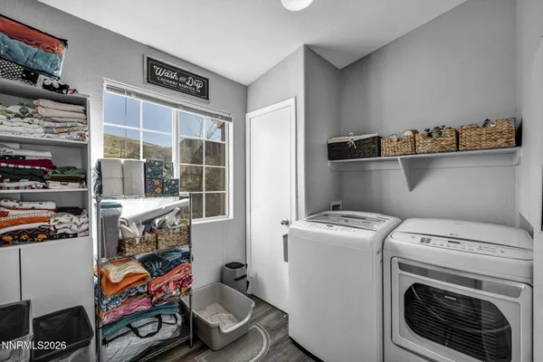 a utility room with dryer and washer