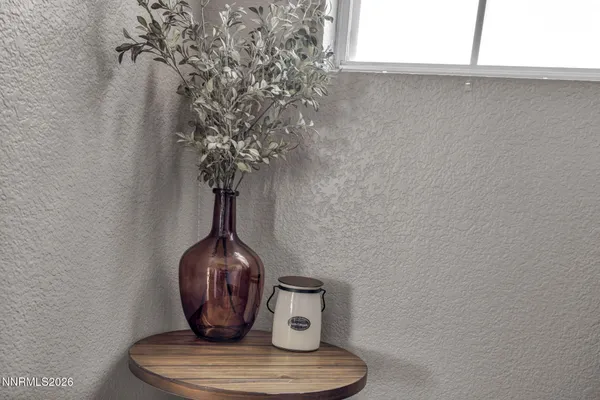 a vase of flowers sitting on a table