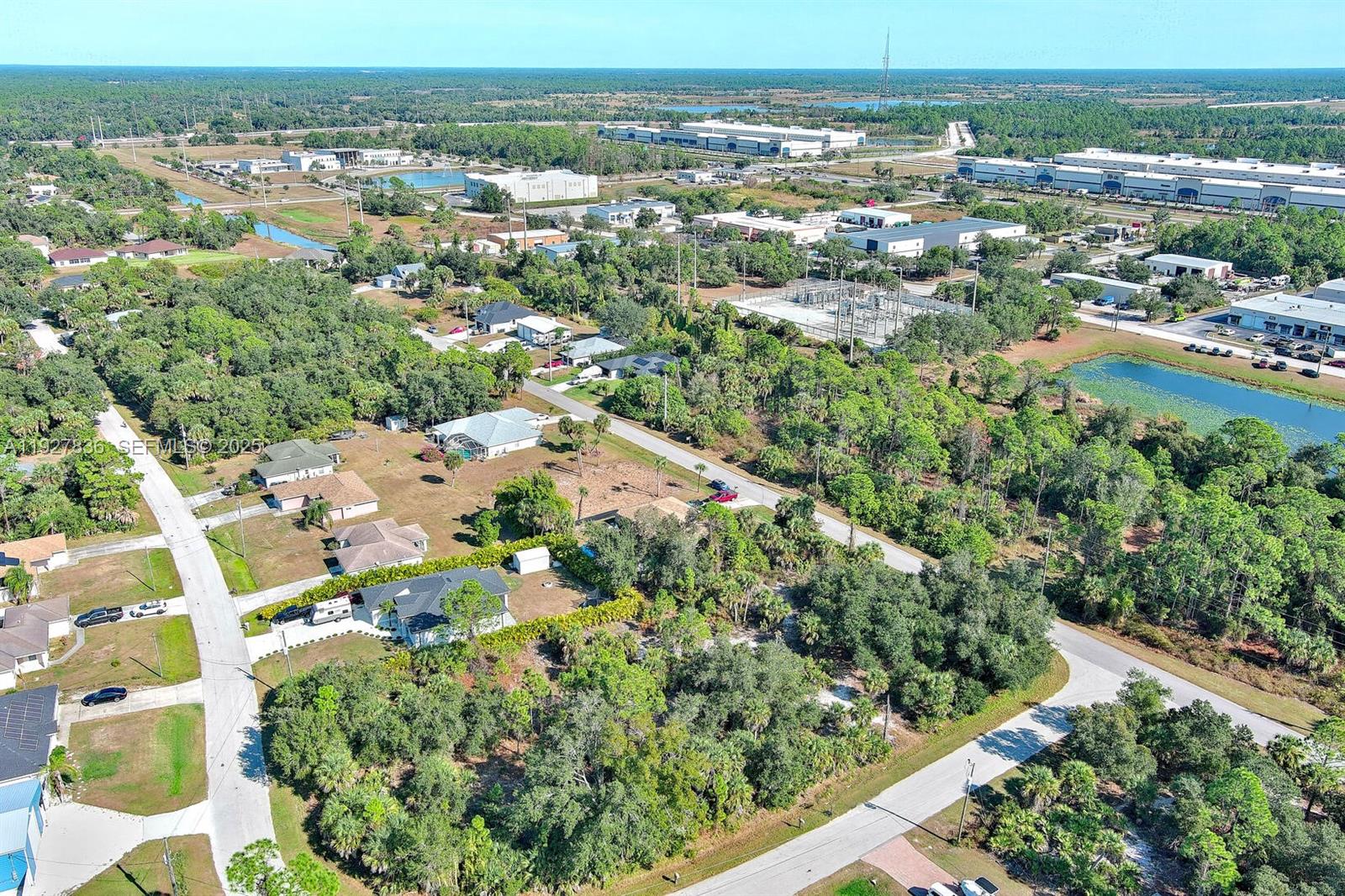 0 Santa Ana Road North Port, FL 34286 - Photo 14 of 21 an aerial view of residential houses with outdoor space