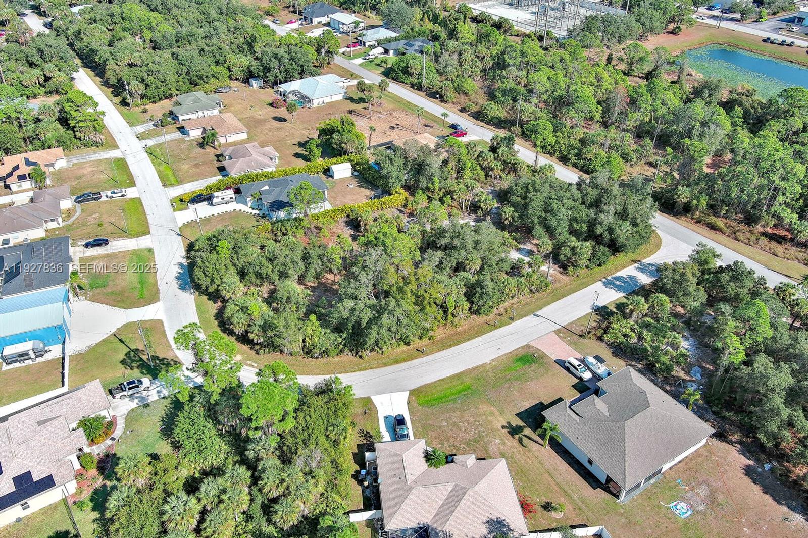 0 Santa Ana Road North Port, FL 34286 - Photo 15 of 21 an aerial view of a house with a yard