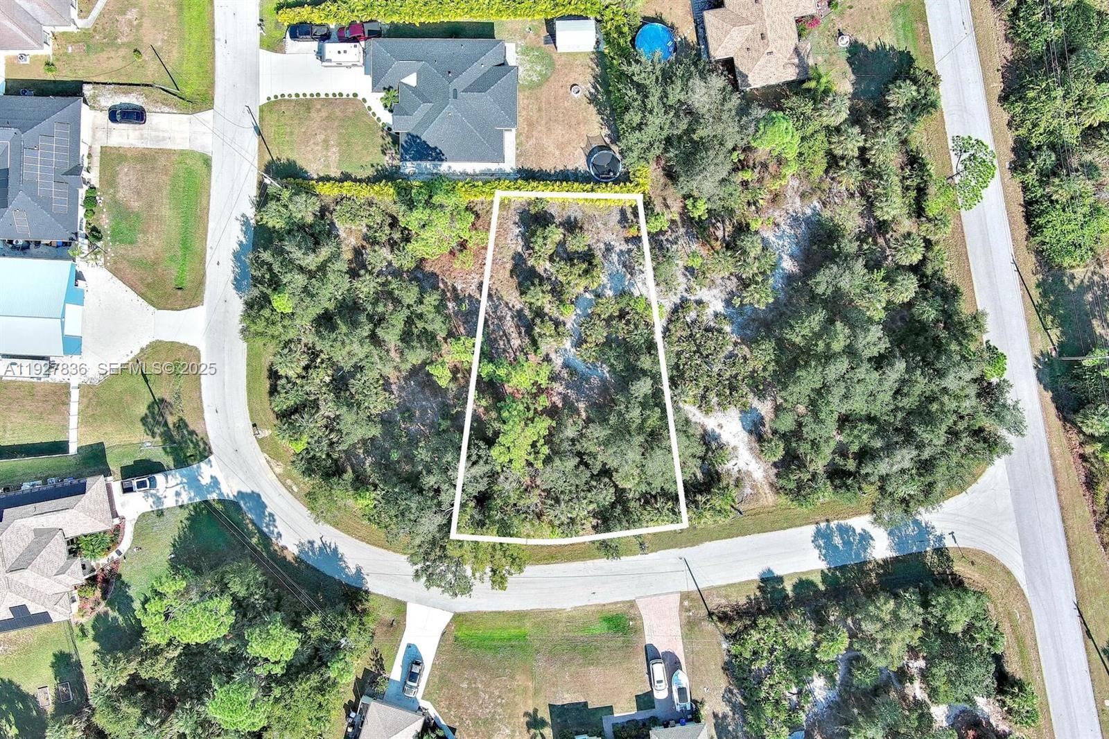 0 Santa Ana Road North Port, FL 34286 - Photo 20 of 21 an aerial view of a residential houses with yard