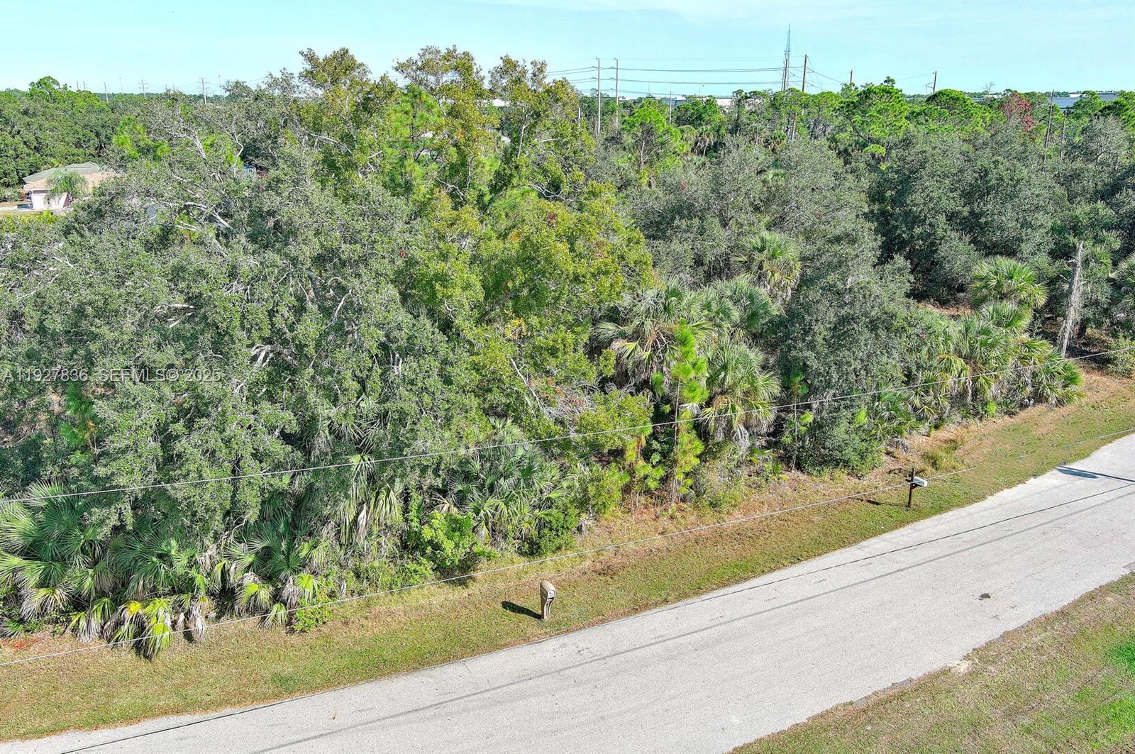 0 Santa Ana Road North Port, FL 34286 - Photo 2 of 21 an outdoor view from a window