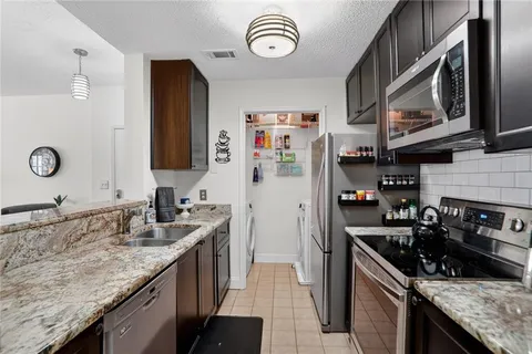 $249,000 | 1074 Peachtree Walk Northeast, Unit B323, Atlanta, GA 30309