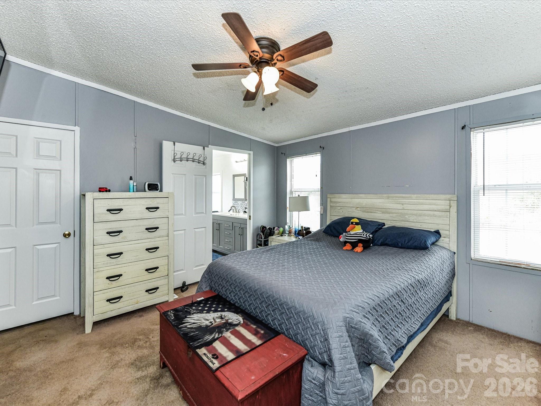 1565 Foxbrook Circle Lancaster, SC 29720 - Photo 14 of 28 a bedroom with bed and a window