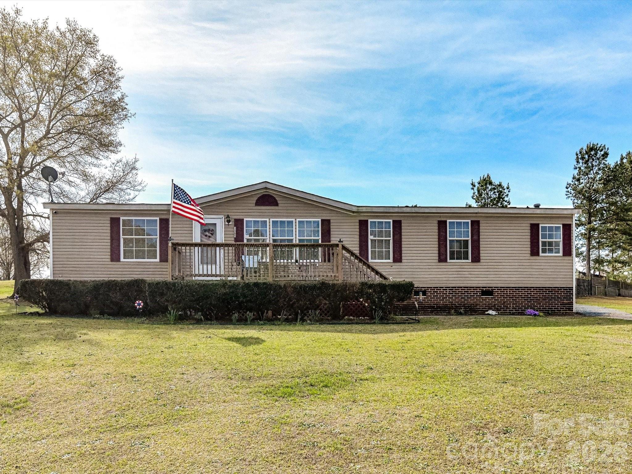 1565 Foxbrook Circle Lancaster, SC 29720 - Photo 2 of 28 a front view of a house with a yard