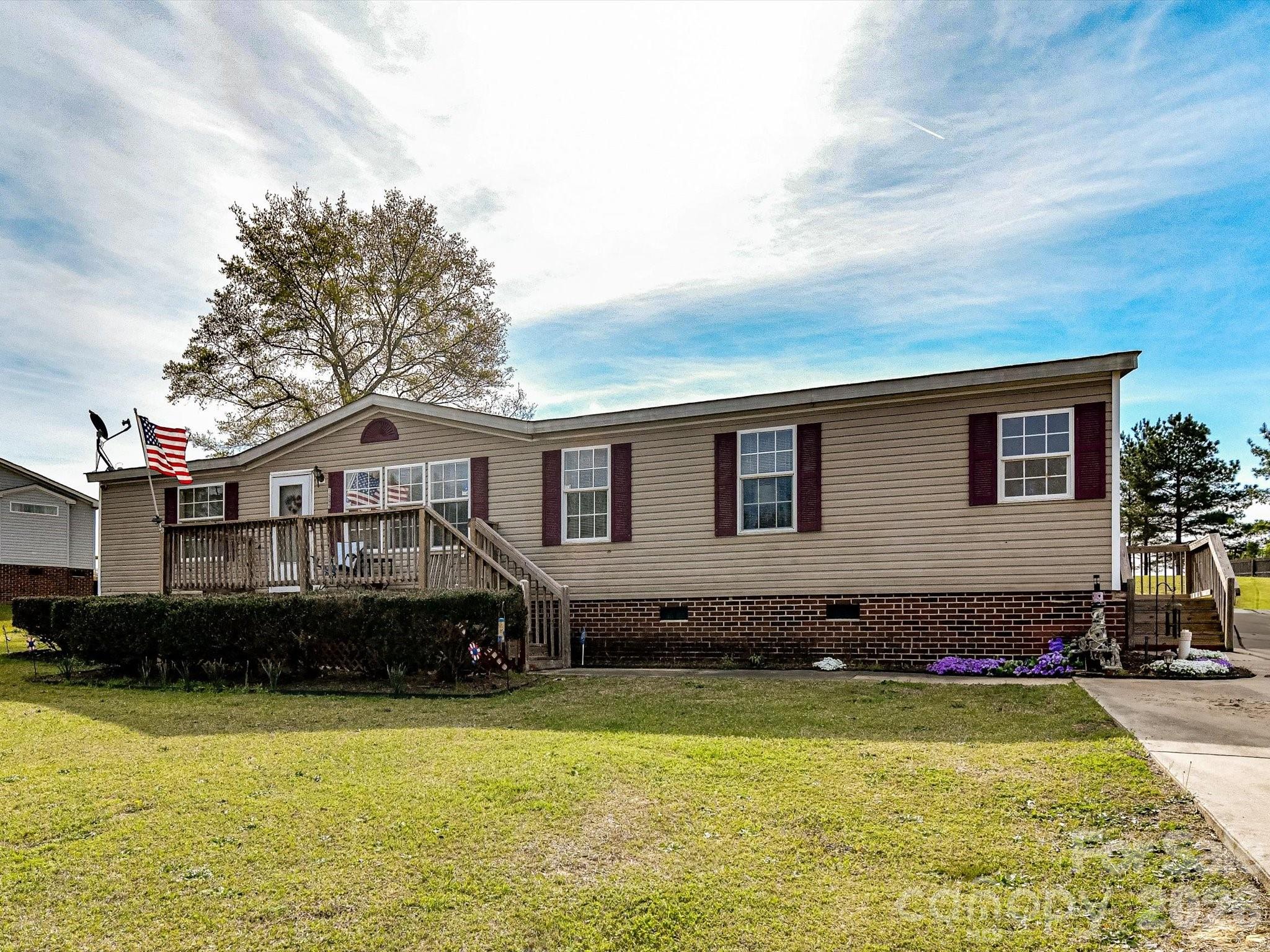 1565 Foxbrook Circle Lancaster, SC 29720 - Photo 3 of 28 a front view of a house with a yard