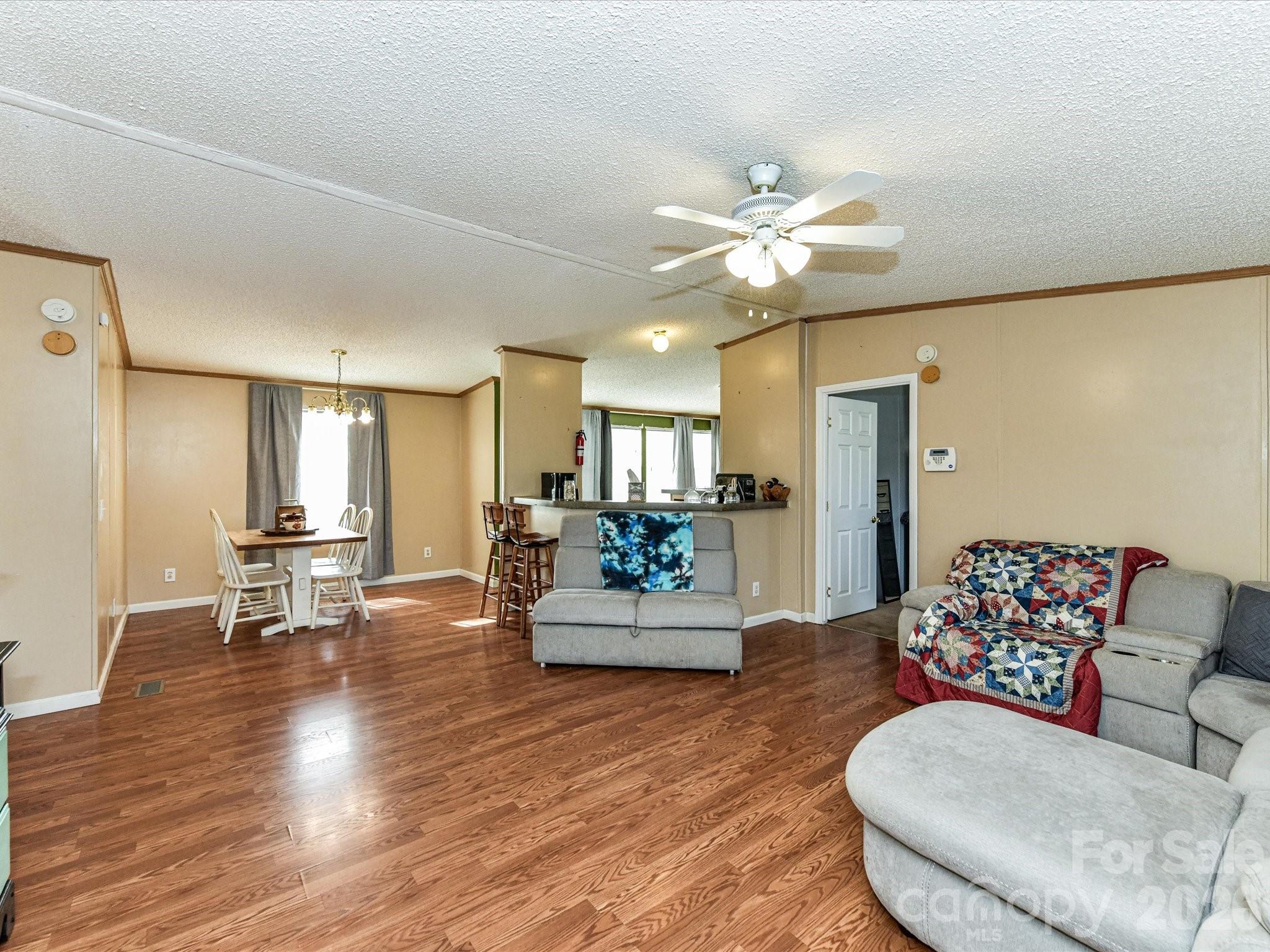 1565 Foxbrook Circle Lancaster, SC 29720 - Photo 6 of 28 a living room with furniture and wooden floor