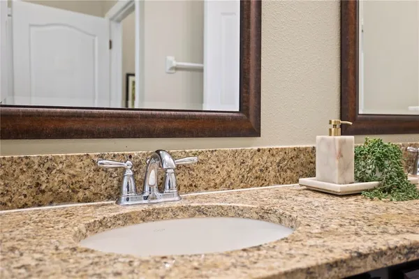 a bathroom with a shower and a bath tub