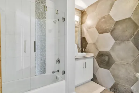 a bathroom with a toilet and a bathtub