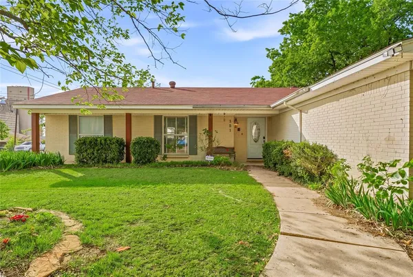 a house view with a garden space