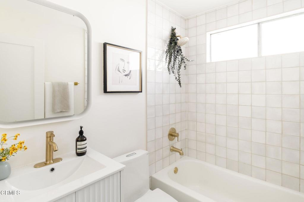 1158 Montecito Drive Los Angeles, CA 90031 - Photo 24 of 42 a bathroom with a sink and a bathtub