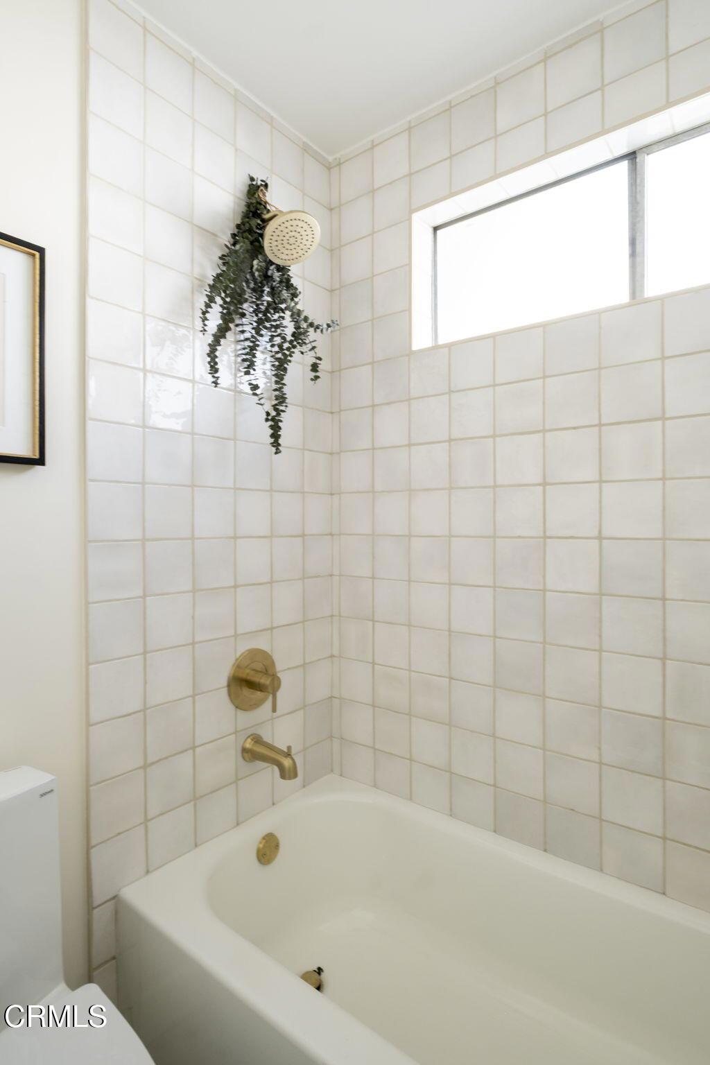 1158 Montecito Drive Los Angeles, CA 90031 - Photo 26 of 42 a bathroom with a bathtub