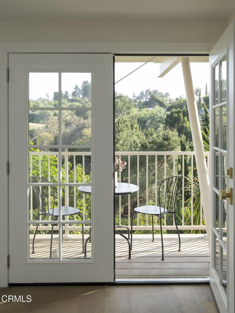 1158 Montecito Drive Los Angeles, CA 90031 - Photo 32 of 42 a view of empty room with wooden floor and windows
