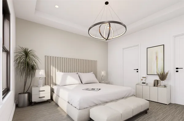 a bed room with a bed and a chandelier