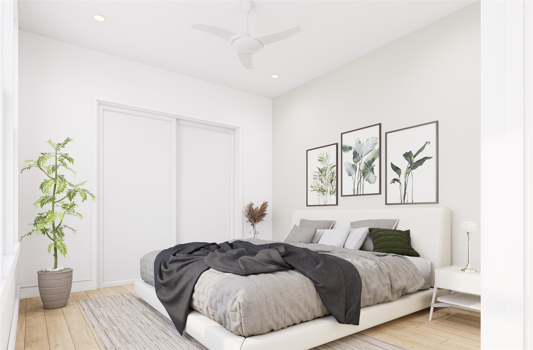 115 Milby Street Houston, TX 77003 - Photo 14 of 16 a bedroom with a bed and a potted plant