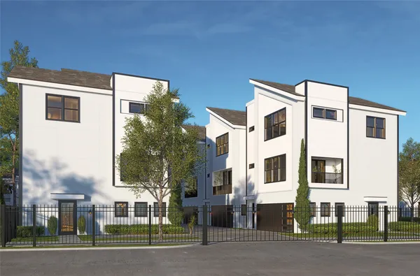 a view of a building with a yard