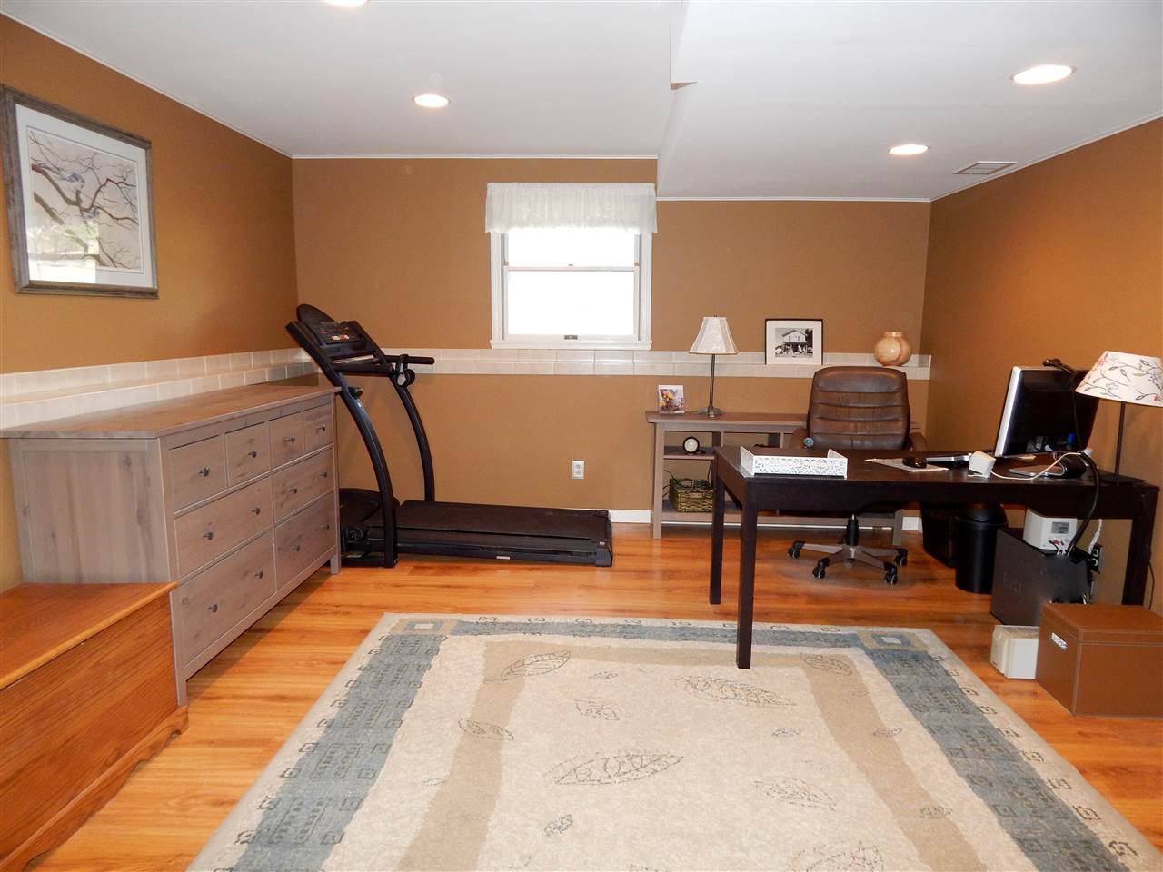4456 Montclair Road Roscoe, IL 61073 - Photo 13 of 25 a view of a room with gym equipment