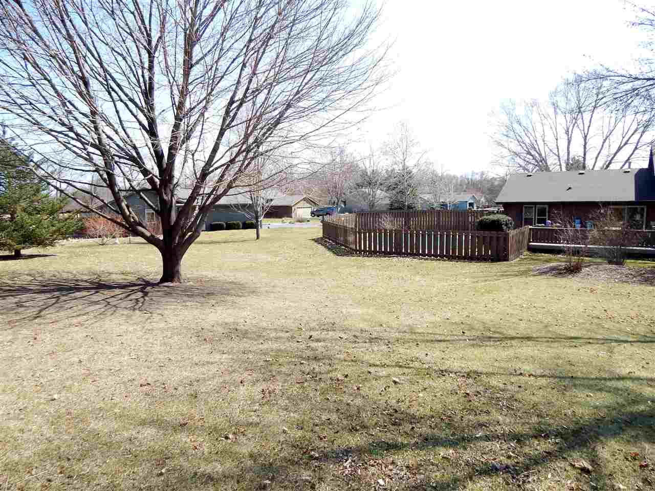 4456 Montclair Road Roscoe, IL 61073 - Photo 24 of 25 a view of a yard with a house