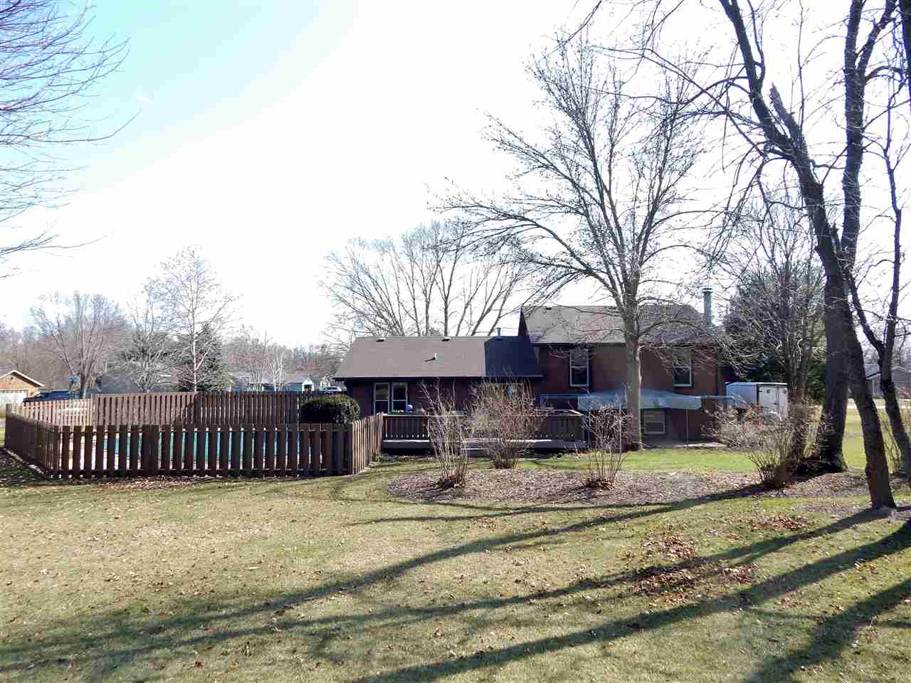 4456 Montclair Road Roscoe, IL 61073 - Photo 25 of 25 a view of a house with a yard covered in snow