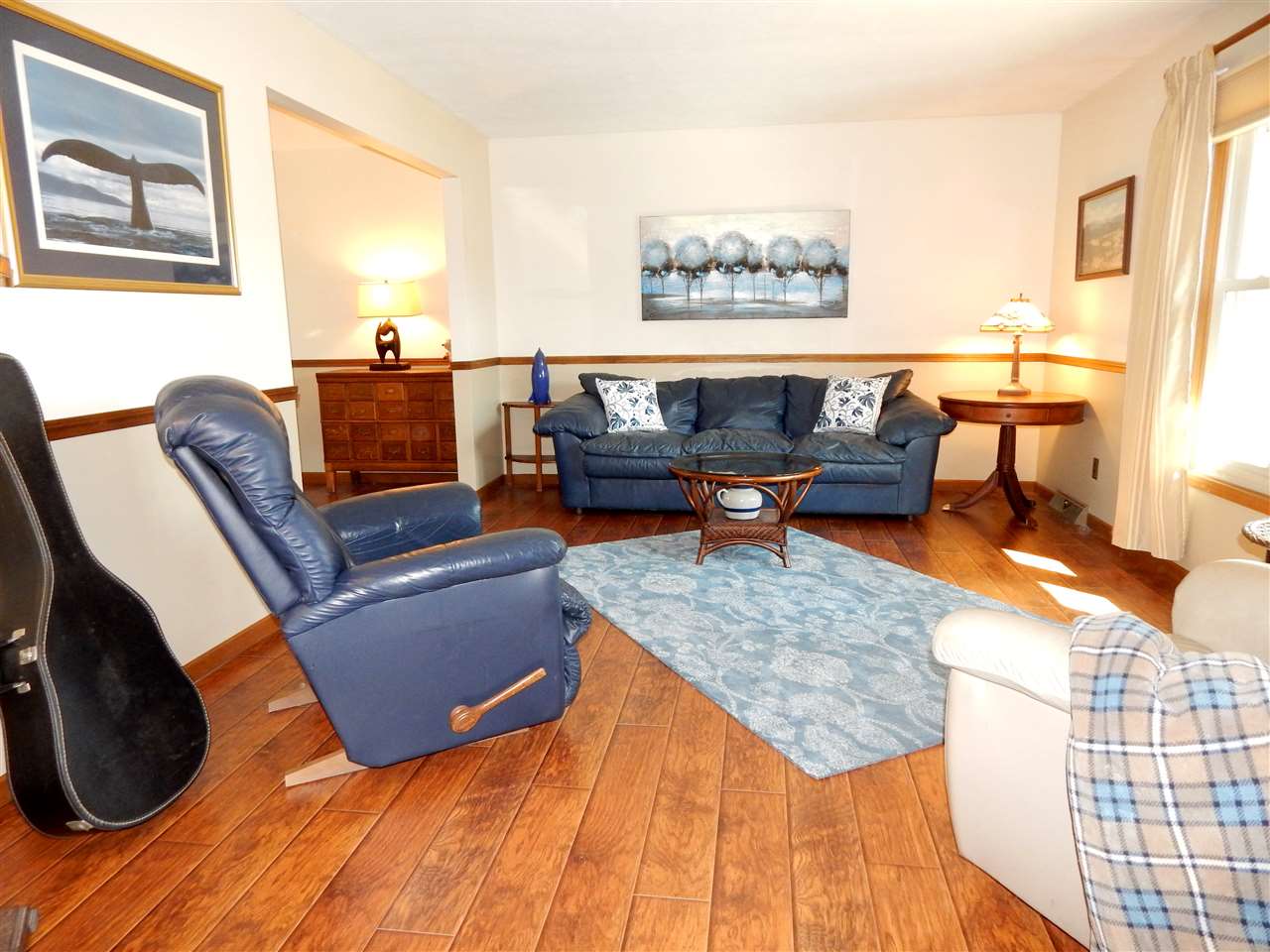 4456 Montclair Road Roscoe, IL 61073 - Photo 3 of 25 a living room with furniture and a rug