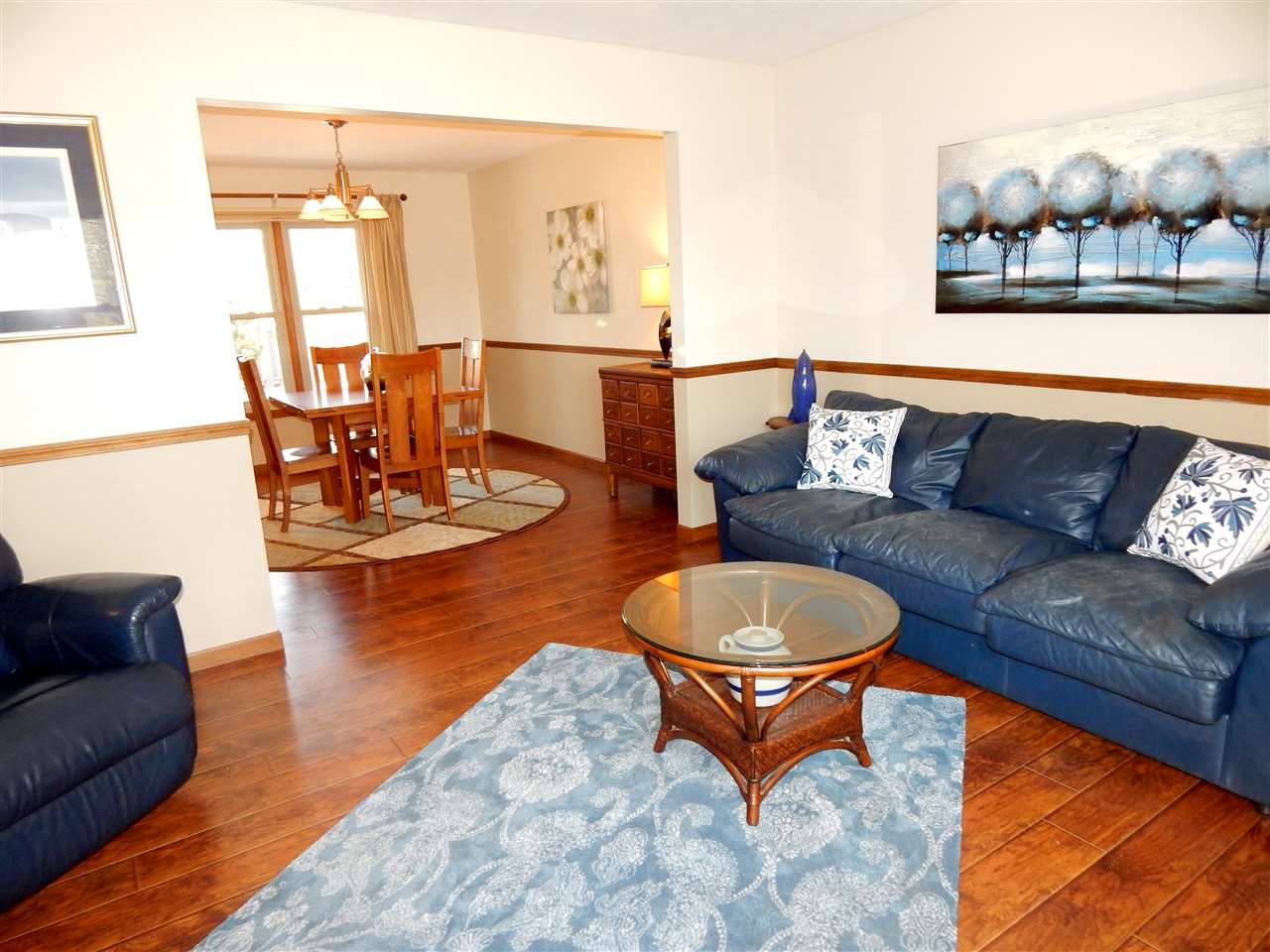 4456 Montclair Road Roscoe, IL 61073 - Photo 4 of 25 a living room with furniture and wooden floor