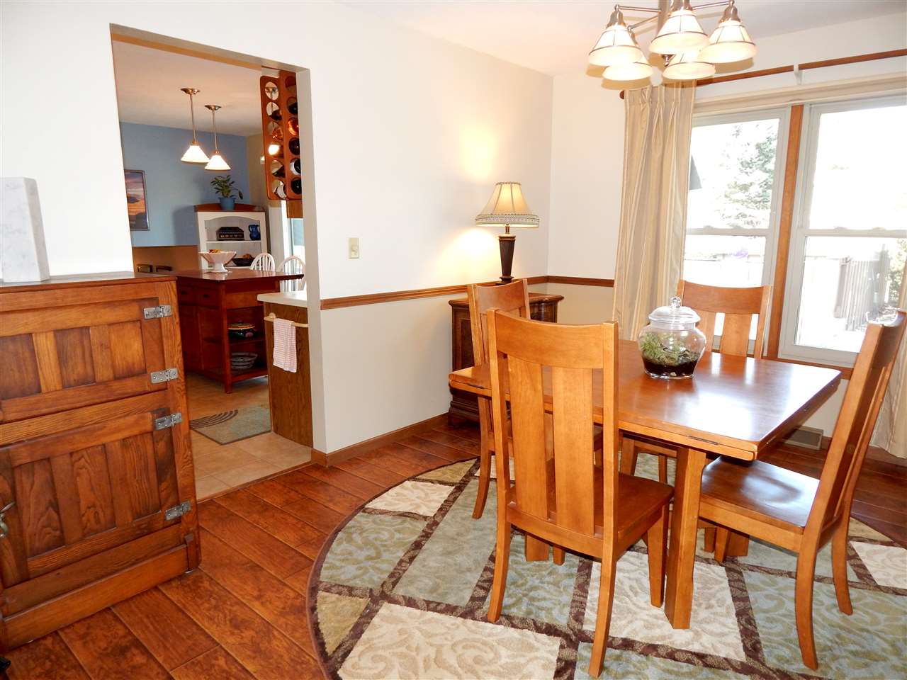 4456 Montclair Road Roscoe, IL 61073 - Photo 6 of 25 a view of a dining room with furniture and a window