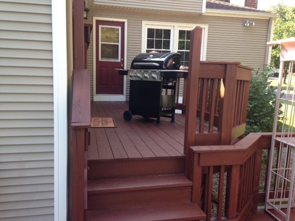 96 Sawmill Road West Springfield, MA 01089 - Photo 3 of 21 a view of a deck with table and chairs with wooden floor and chair