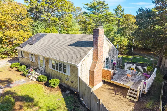 swimming pool view with a seating space