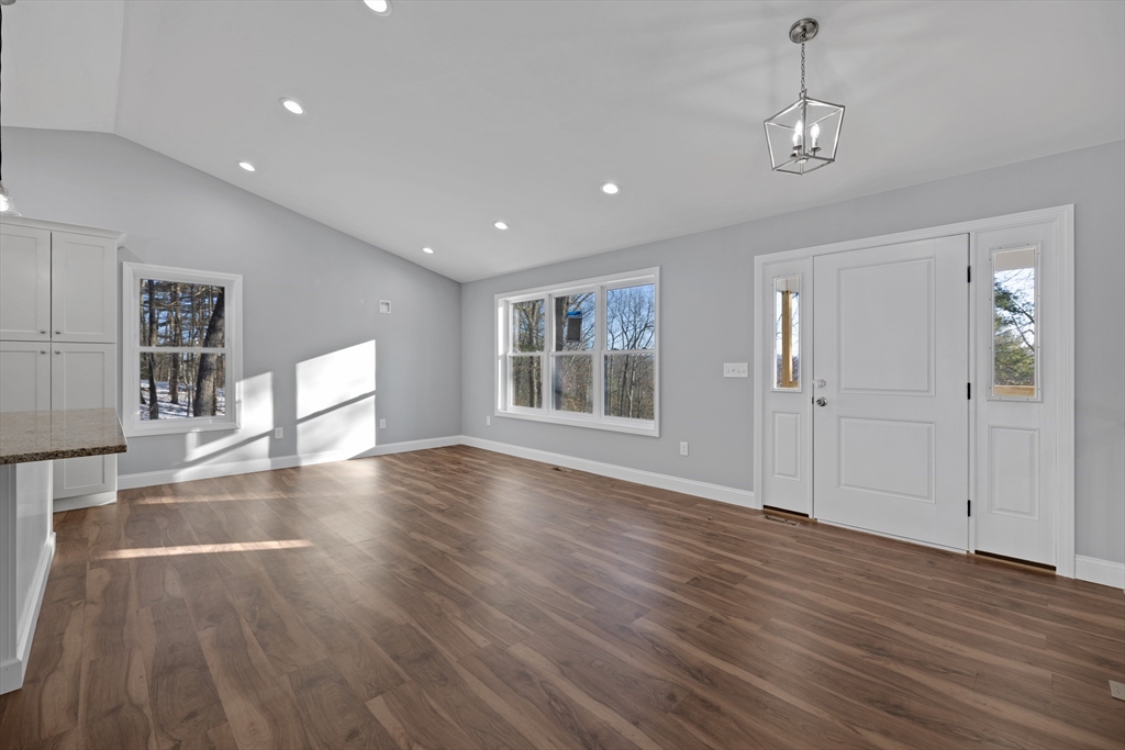 132 Kibbe Road East Longmeadow, MA 01028 - Photo 11 of 32 a view of a livingroom with wooden floor and window