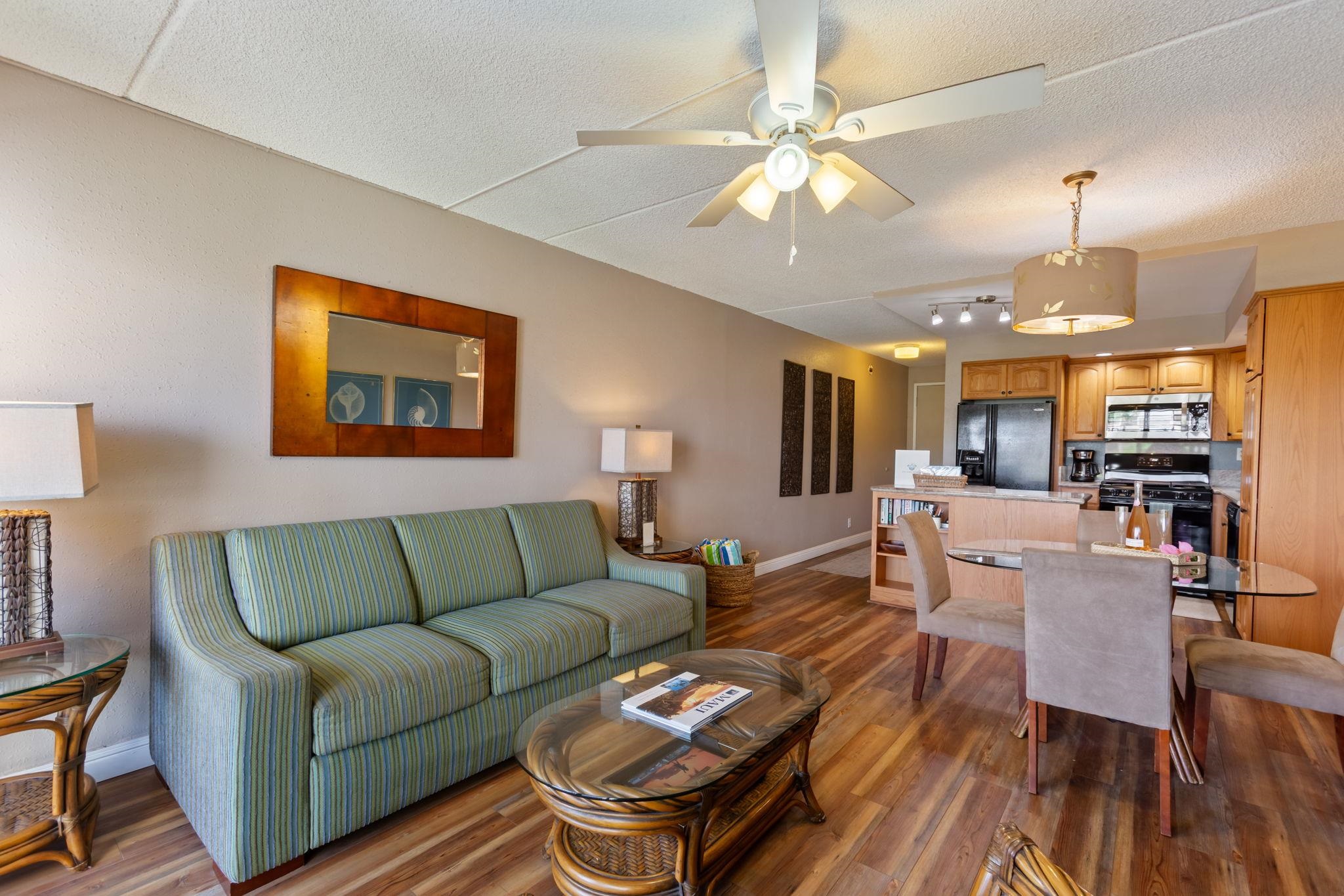 2531 South Kihei Road, Unit C414 Kihei, HI 96753 - Photo 13 of 47 a living room with furniture kitchen view and a chandelier