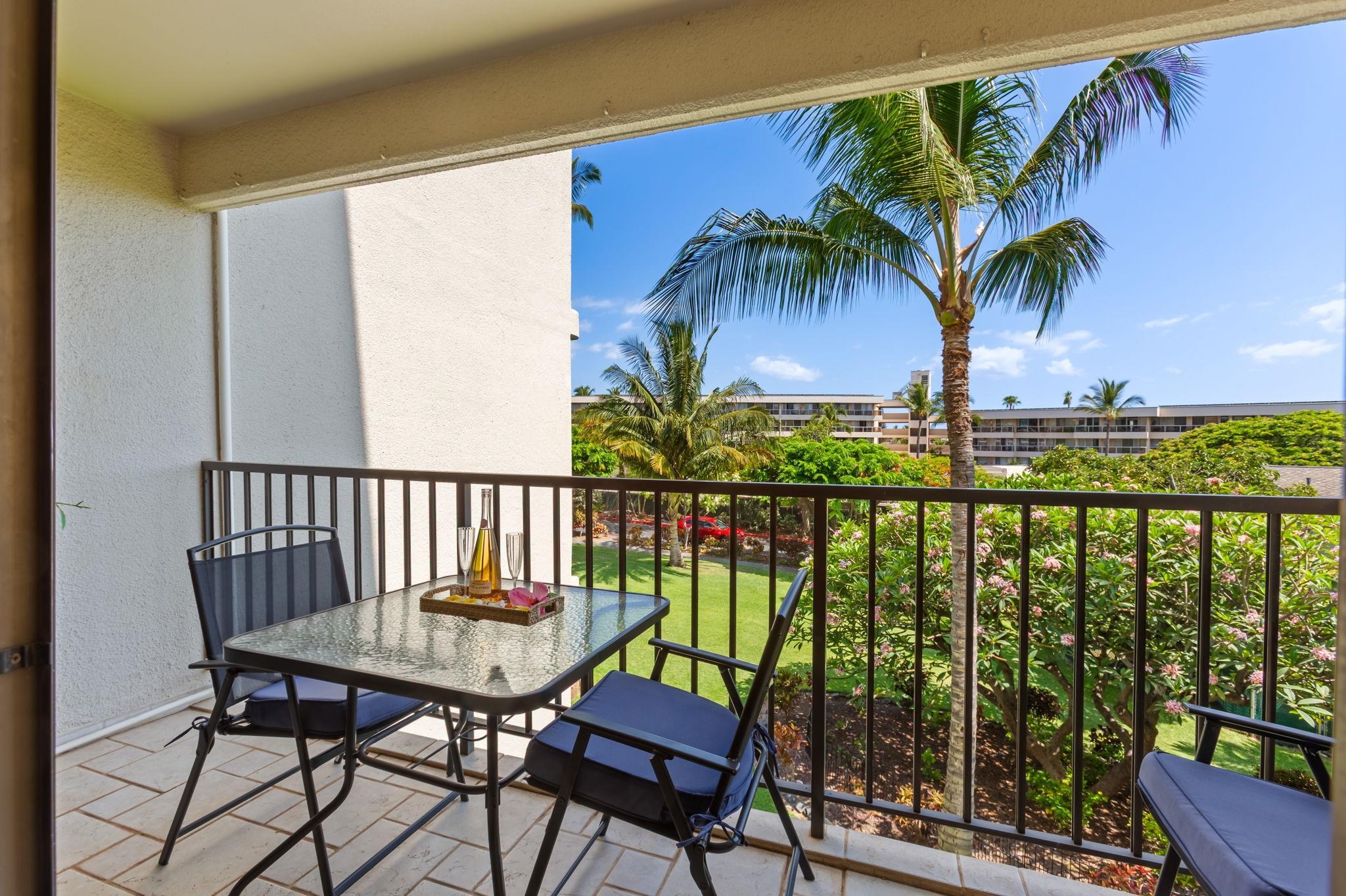 2531 South Kihei Road, Unit C414 Kihei, HI 96753 - Photo 15 of 47 a view of a chairs and table in patio