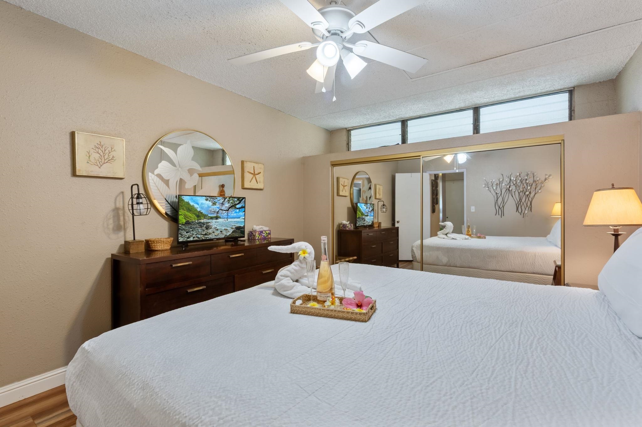 2531 South Kihei Road, Unit C414 Kihei, HI 96753 - Photo 28 of 47 a bedroom with a bed and a dresser