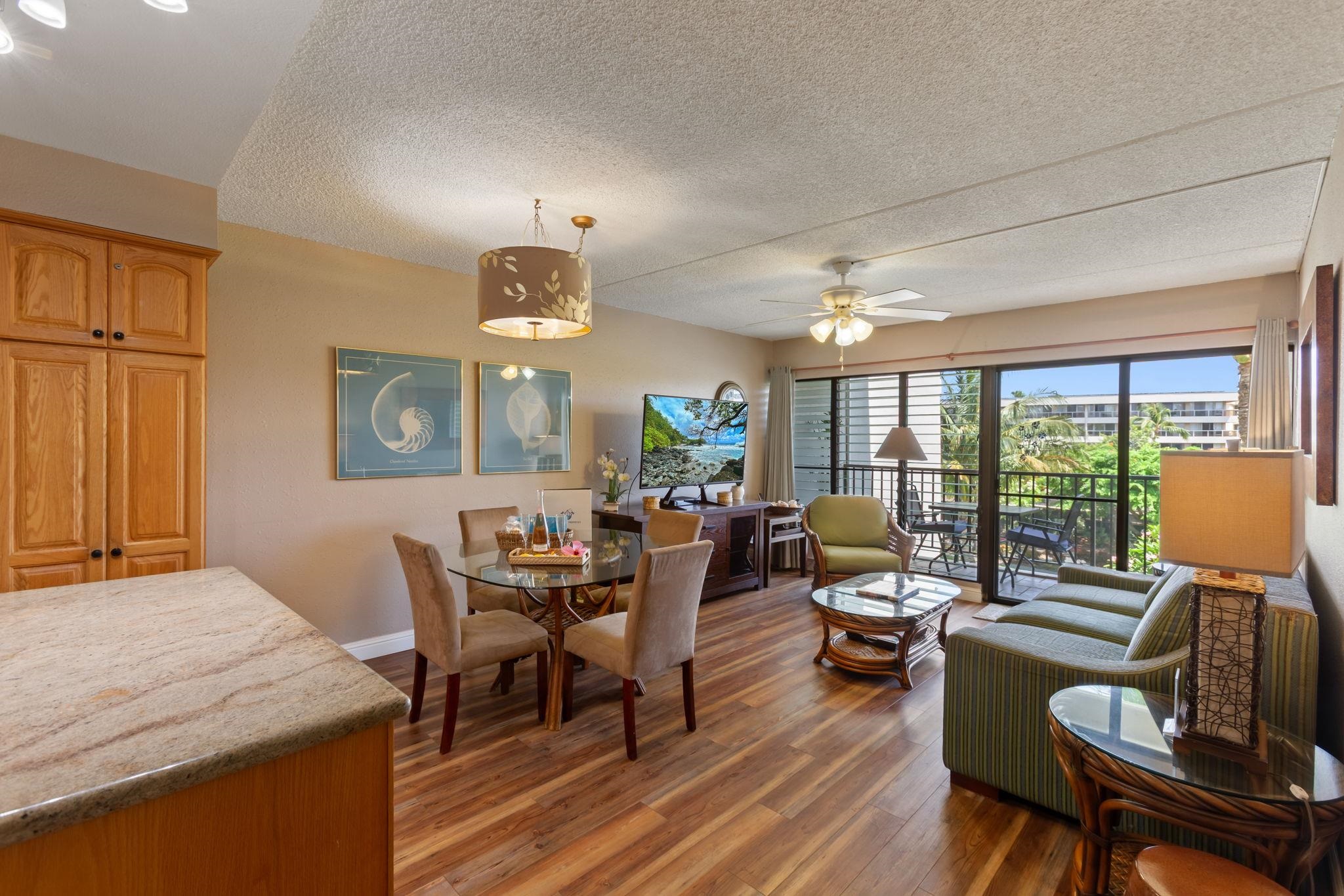 2531 South Kihei Road, Unit C414 Kihei, HI 96753 - Photo 7 of 47 a living room with furniture and wooden floor