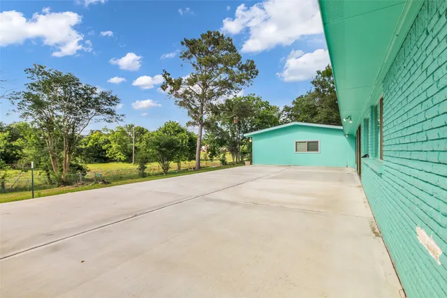 a view of a yard in front of a house