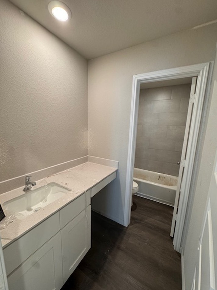 13626 Kit Run Splendora, TX 77372 - Photo 8 of 43 a bathroom with a granite countertop sink toilet and tub