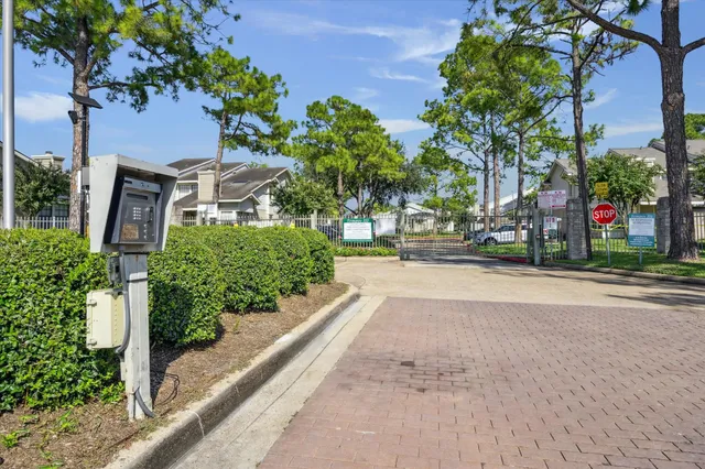 a view of street with houses and trees