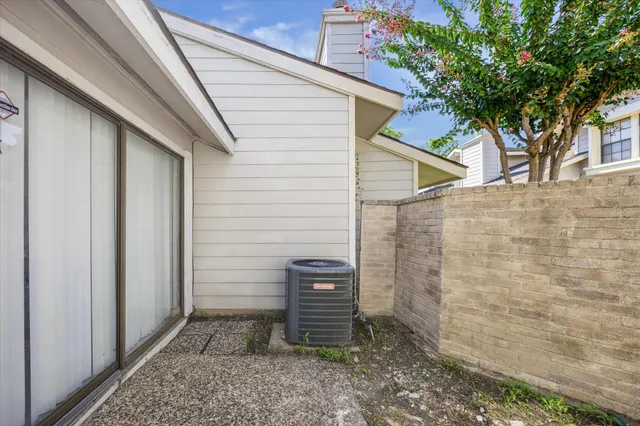 a view of a backyard of the house