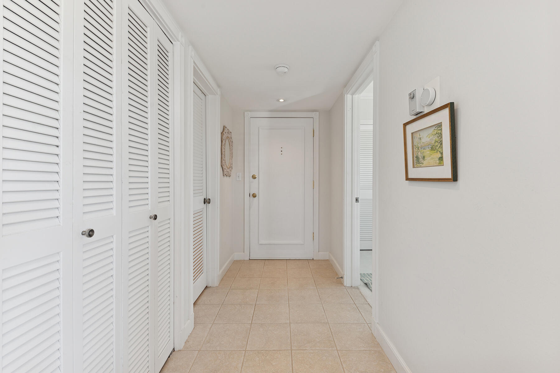 3883 Gulf Stream Road, Unit 1N Gulf Stream, FL 33483 - Photo 7 of 30 a view of a hallway with closet area