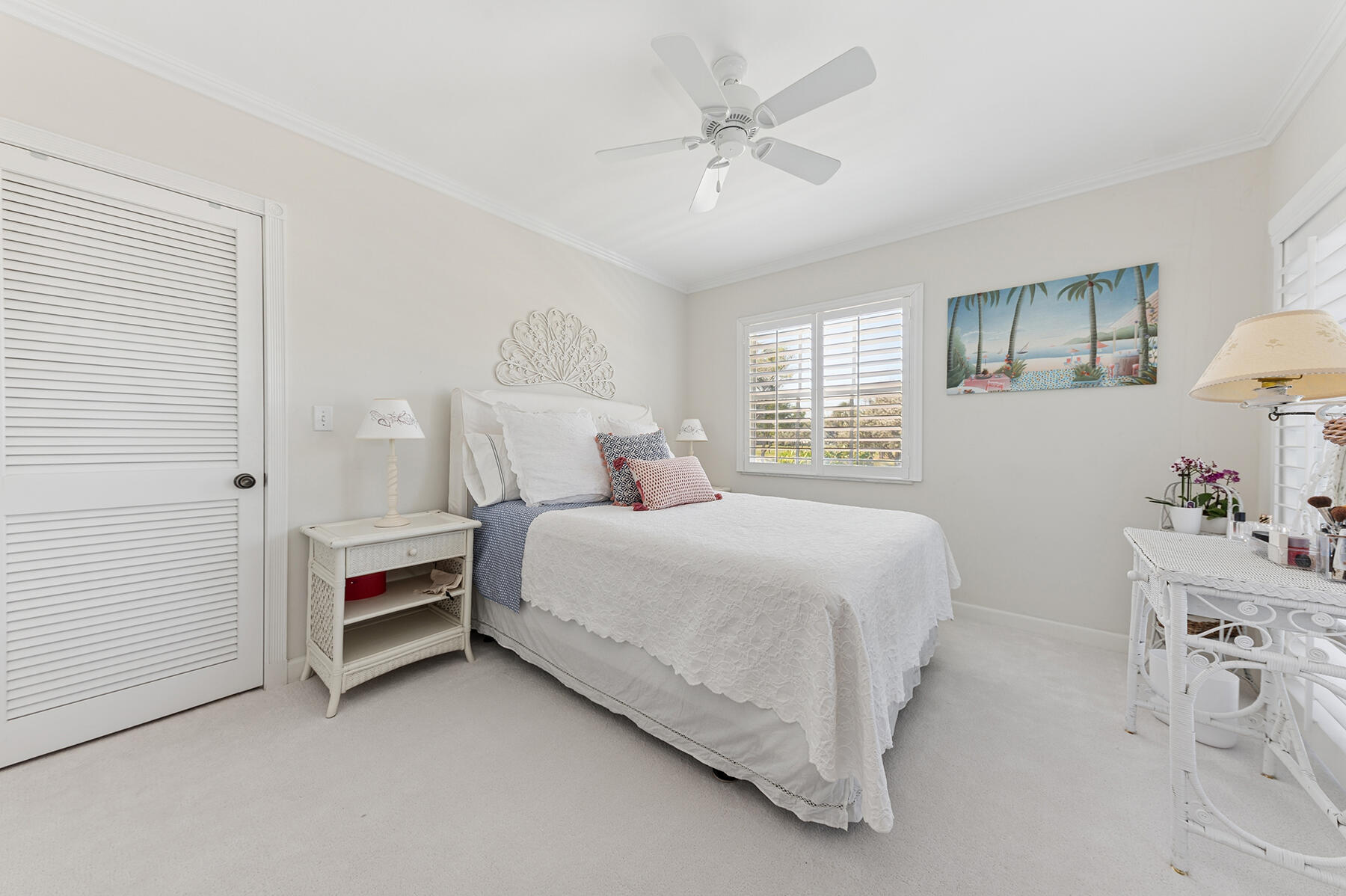 3883 Gulf Stream Road, Unit 1N Gulf Stream, FL 33483 - Photo 8 of 30 a bed room with a bed and a window