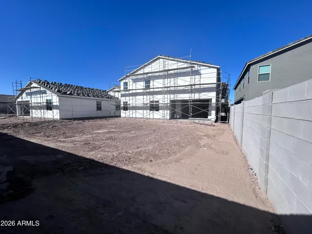 a view of a road with a building in the background