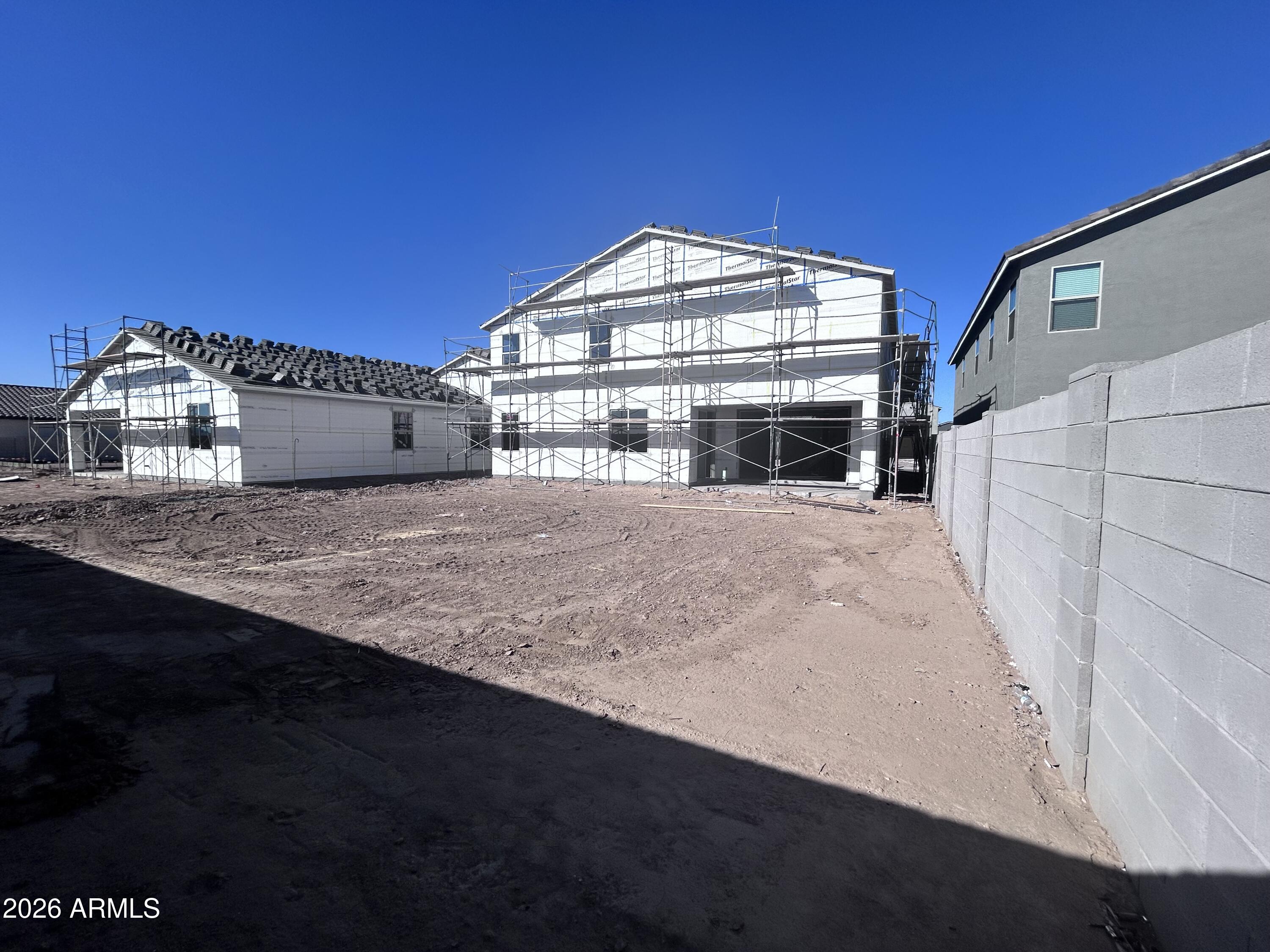 2683 Homesteaders Road San Tan Valley, AZ 85140 - Photo 8 of 21 a view of a house with a big yard